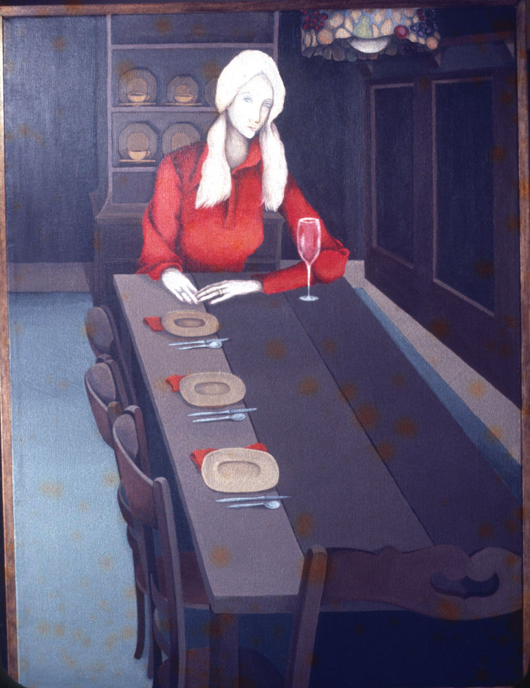 unnamed woman sitting at table